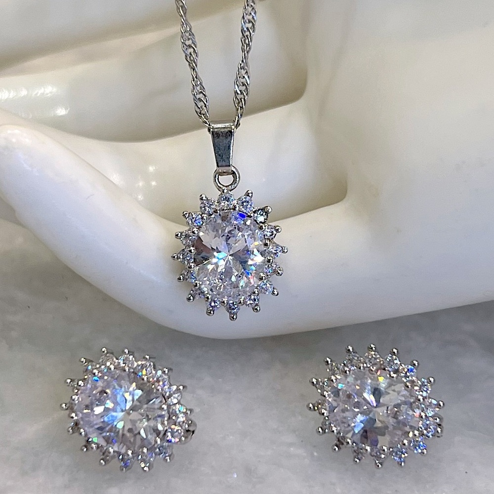 White Diamond Silver Sunburst Pendant Necklace and Earrings
